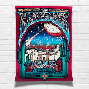 Psychedelic concert poster featuring a southwestern desert cityscape with flying saucers in a starry night sky.