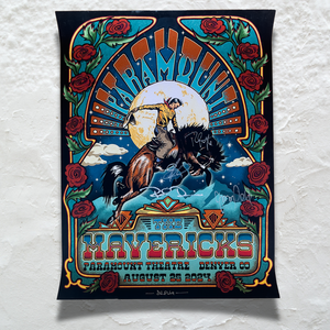 Colorful concert poster featuring a cowboy riding a bucking horse surrounded by an ornate Art Nouveau-style frame with roses.