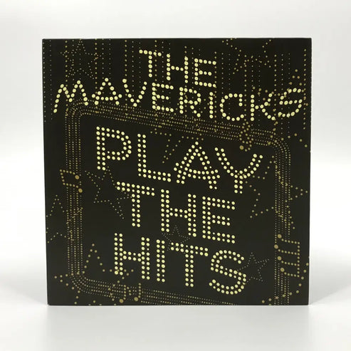 Album cover for ’Play The Hits’ by The Mavericks, featuring illuminated dot-matrix style lettering on a dark background.