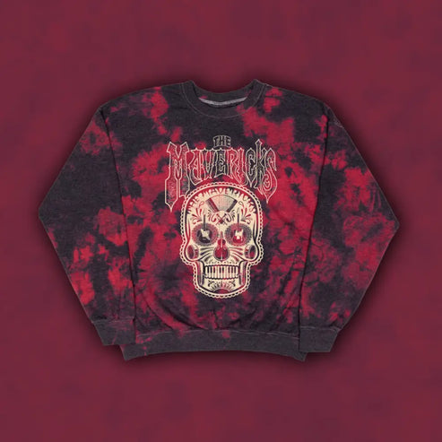 Tie-dyed sweatshirt featuring a skull design and ’Mavericks’ text.