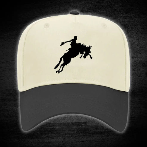Two-tone baseball cap with rodeo silhouette.
