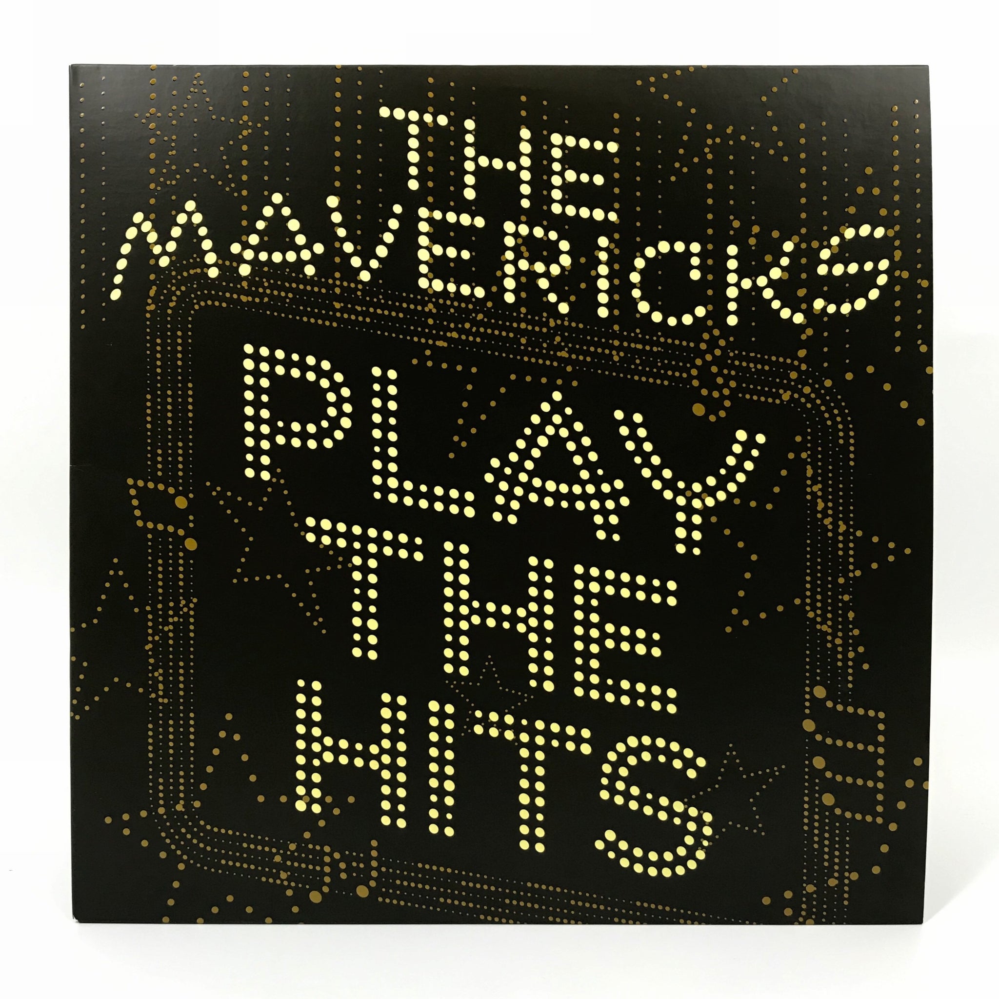 Album cover for ’Play the Hits’ by The Mavericks, featuring illuminated text on a dark background.